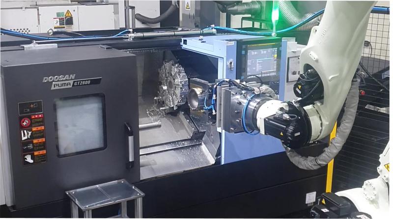 자동차 부품 가공라인의 소재투입 및 배출 공정의 자동화 시스템